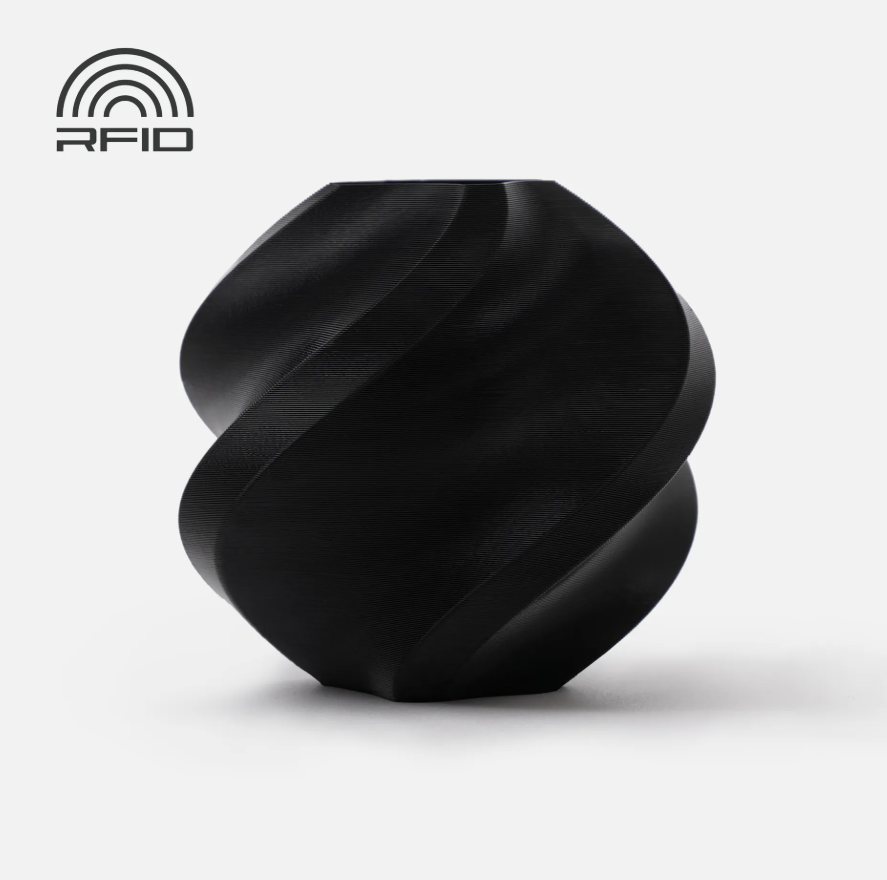Black swirled object Printed in Bambu Lab Basic PLA Black object with RFID logo on a light gray background