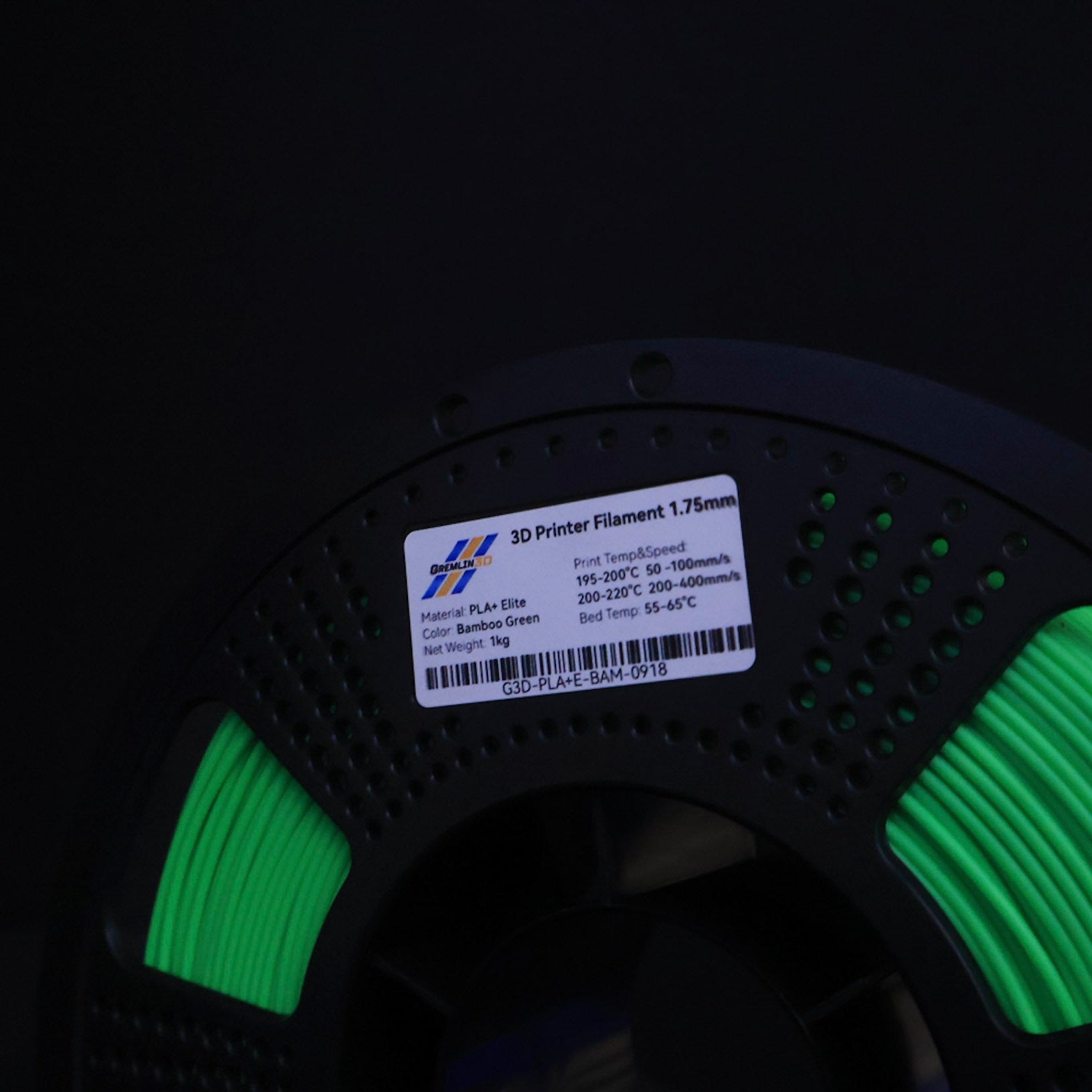 1kg 1.75mm Spool of 3D printing Bamboo Green PLA Plus filament with a visible brand label on a black background