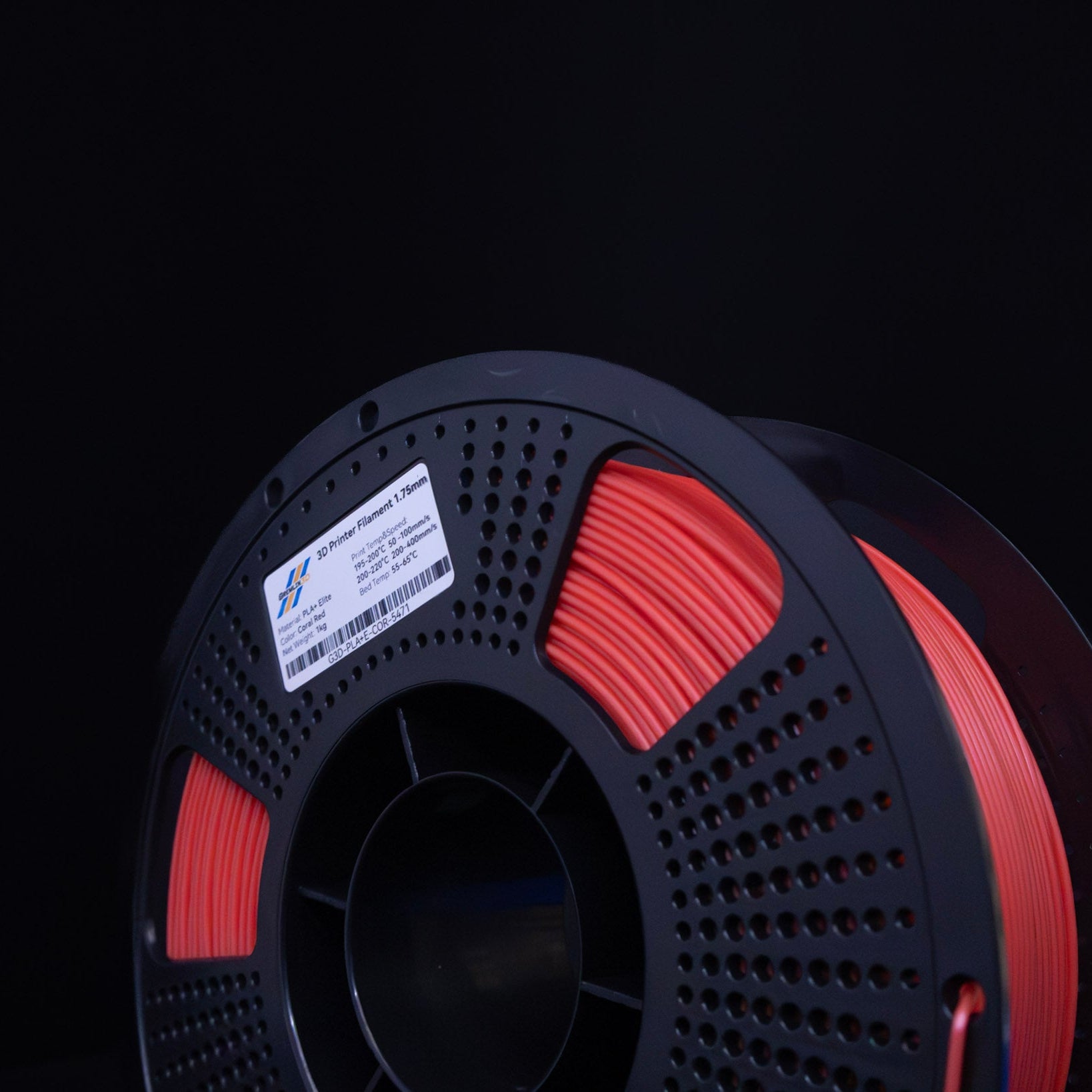 1kg 1.75mm Spool of 3D printing Coral Red PLA Plus filament with a visible brand label on a black background