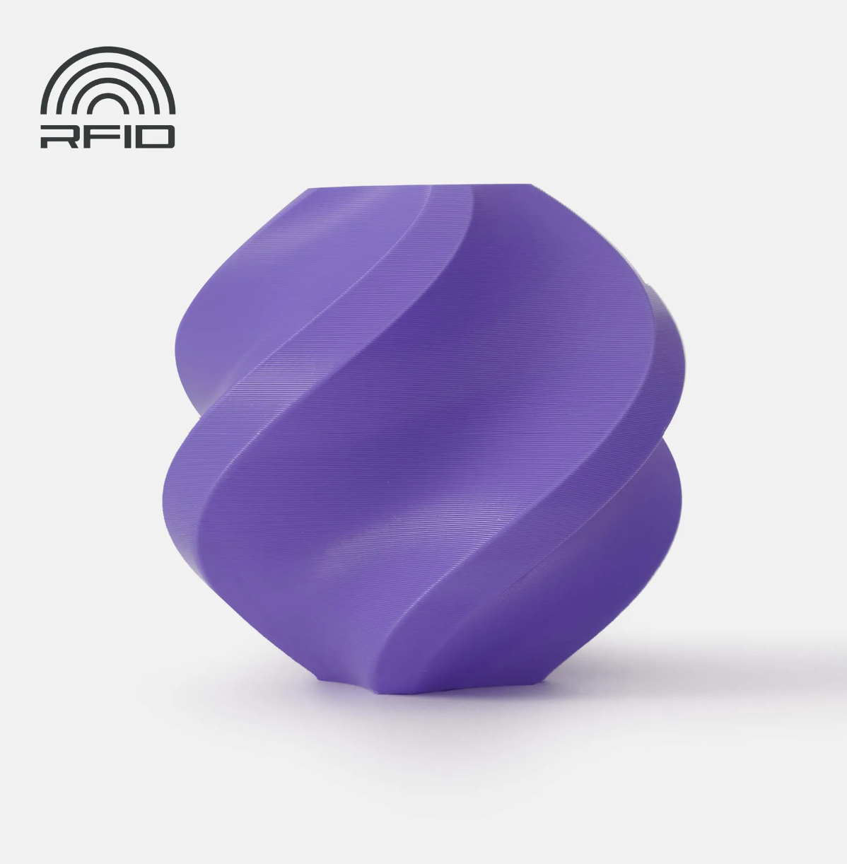 Black swirled object Printed in Bambu Lab Basic PLA Purple object with RFID logo on a light gray background