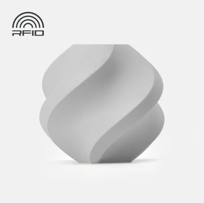 Black swirled object Printed in Bambu Lab Basic PLA Grey object with RFID logo on a light gray background