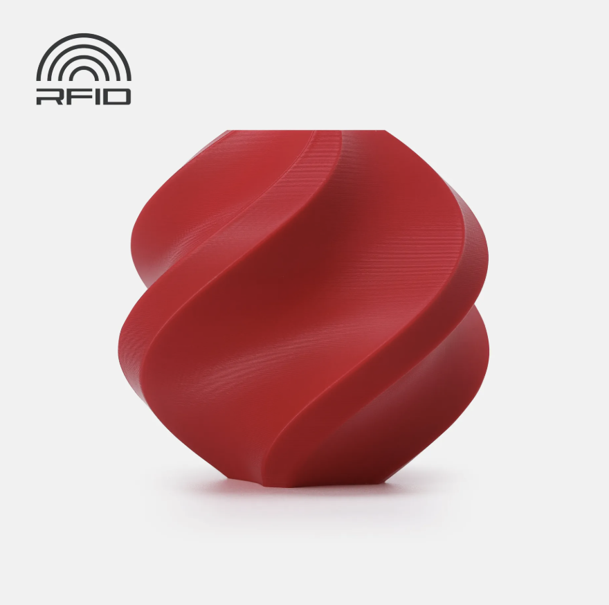 Red swirled object Printed in Bambu Lab Basic PLA with RFID logo on a light gray background