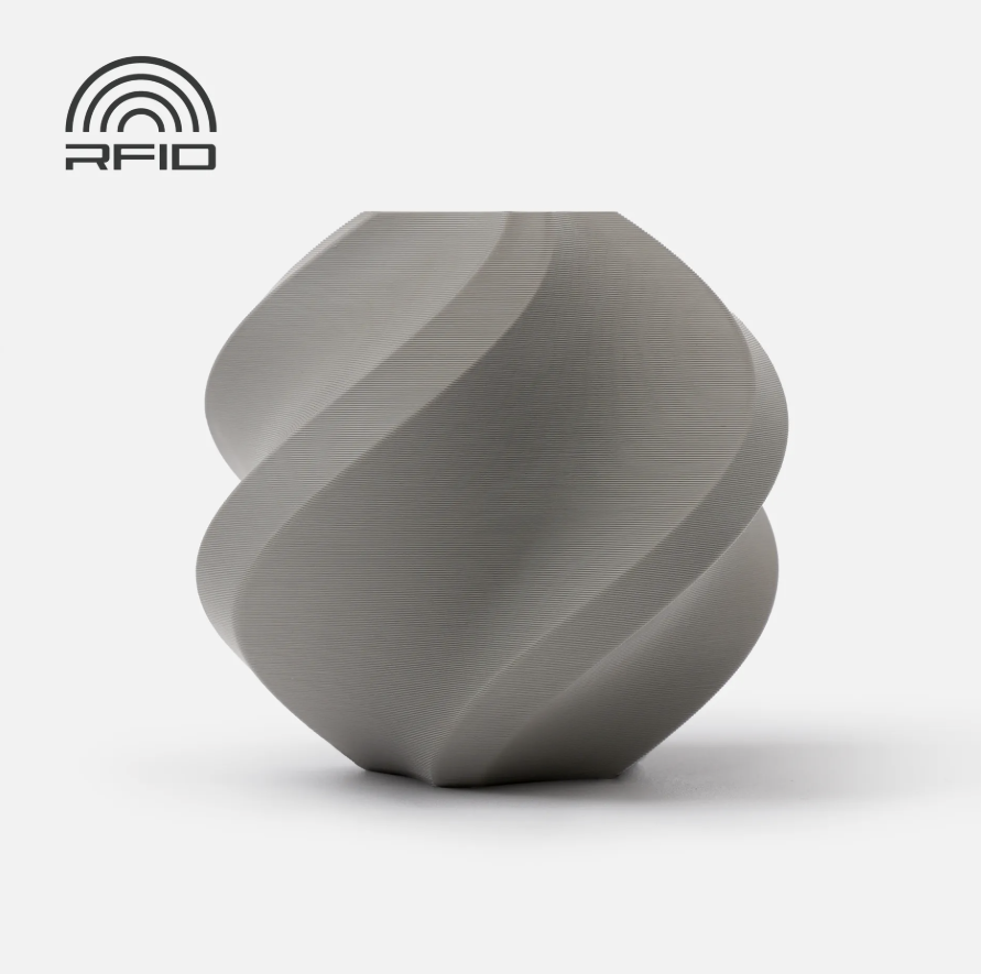 grey colored swirled object Printed in Bambu Lab Basic PLA with RFID logo on a light gray background