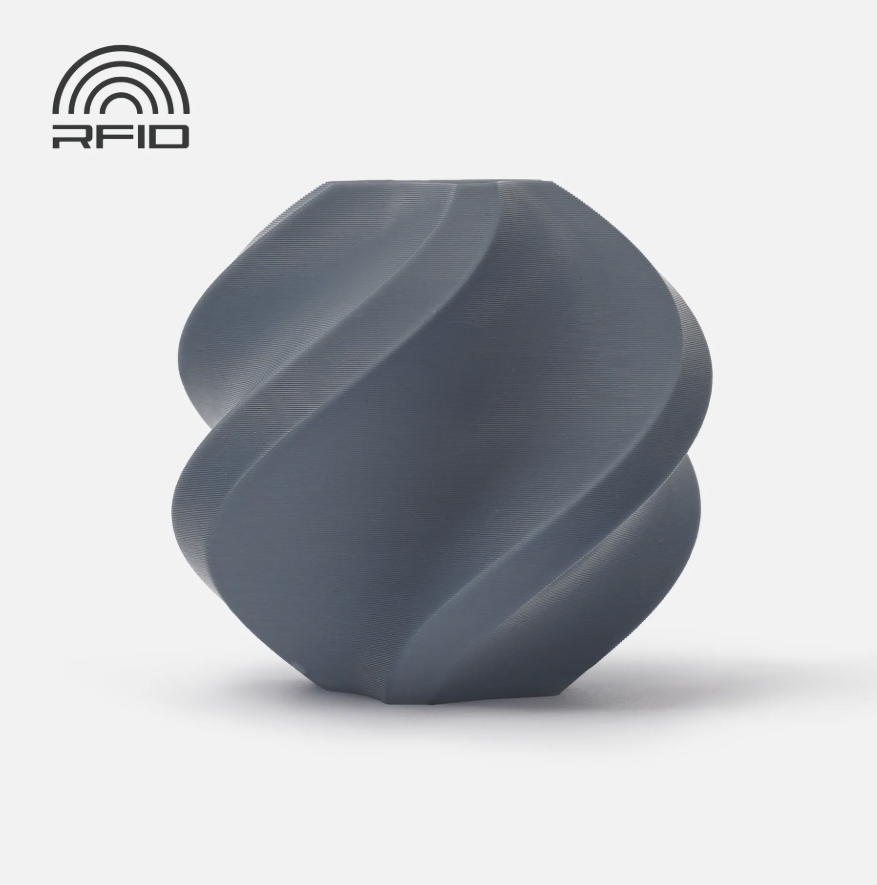 Blue Grey colored swirled object Printed in Bambu Lab Basic PLA with RFID logo on a light gray background